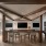 large social room with tvs and game areas