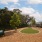 a gated dog park with play features