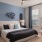 a bedroom with a bed and a fan