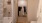 bathroom with walk in closet in the background