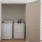 closet with washer and dryer