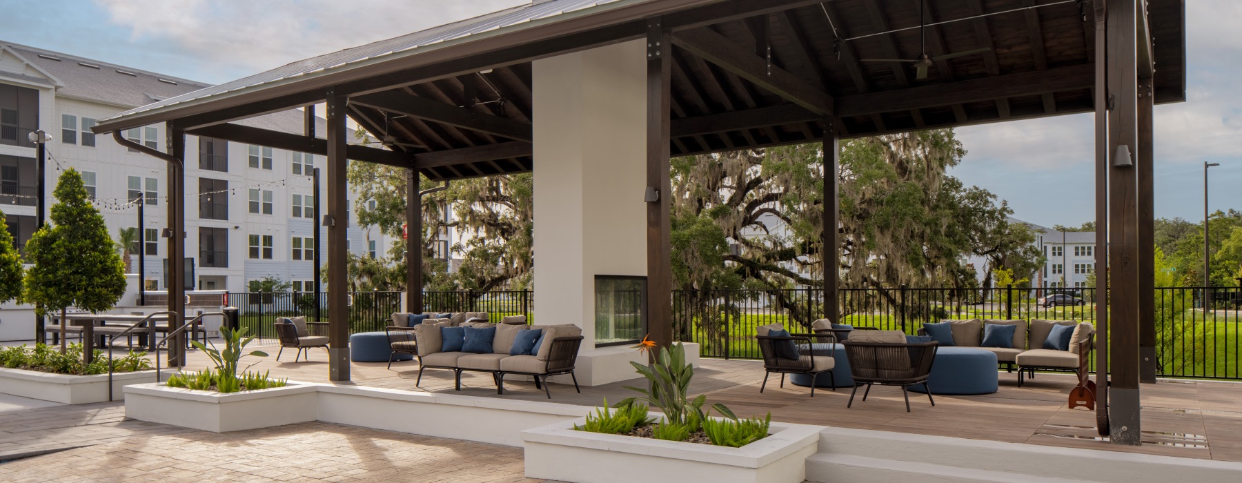 pavilion with a fireplace and seating
