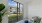 screened in porch with seating