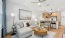 well lit living room and kitchen 