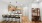 a kitchen with a white counter top and bar stools